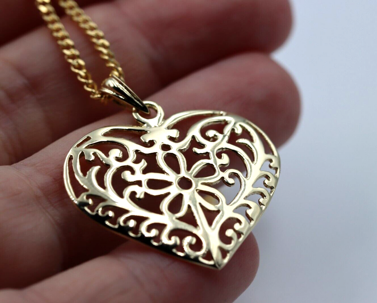 Gold filigree heart discount necklace