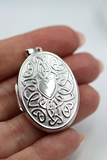 Genuine Sterling Silver Centre Heart Celtic Design 6 Photo Oval Locket
