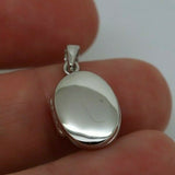 Sterling Silver Small Oval Locket Pendant With 2 Photos