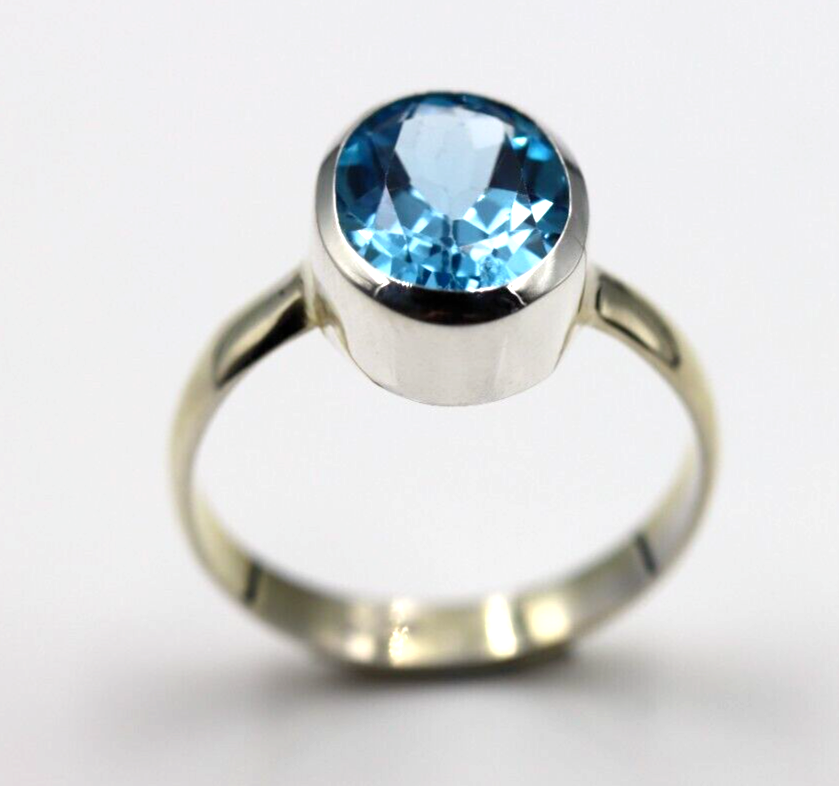 Size N / 6.5 Genuine Sterling Silver Blue Topaz Oval Ring